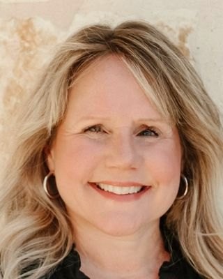 Portrait of Nikki Holmes